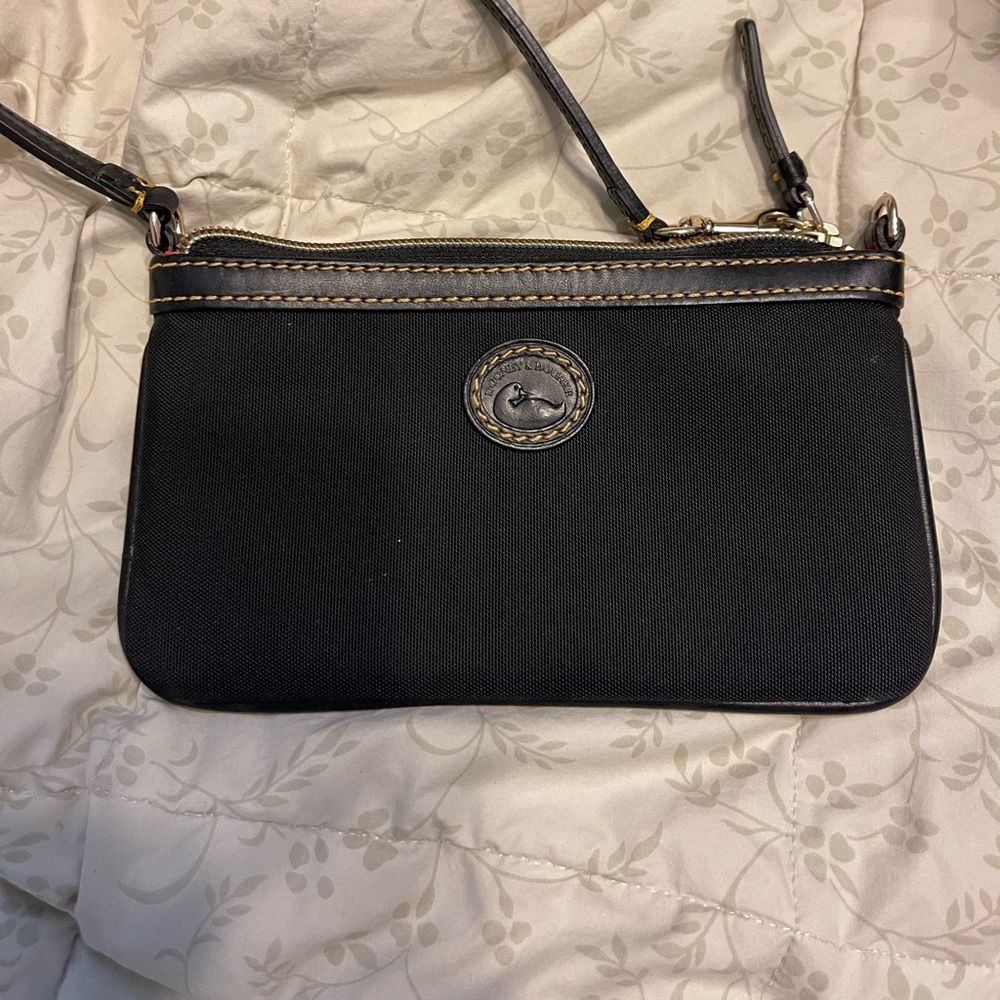 Dooney & Bourke wristlet. Like new condition.